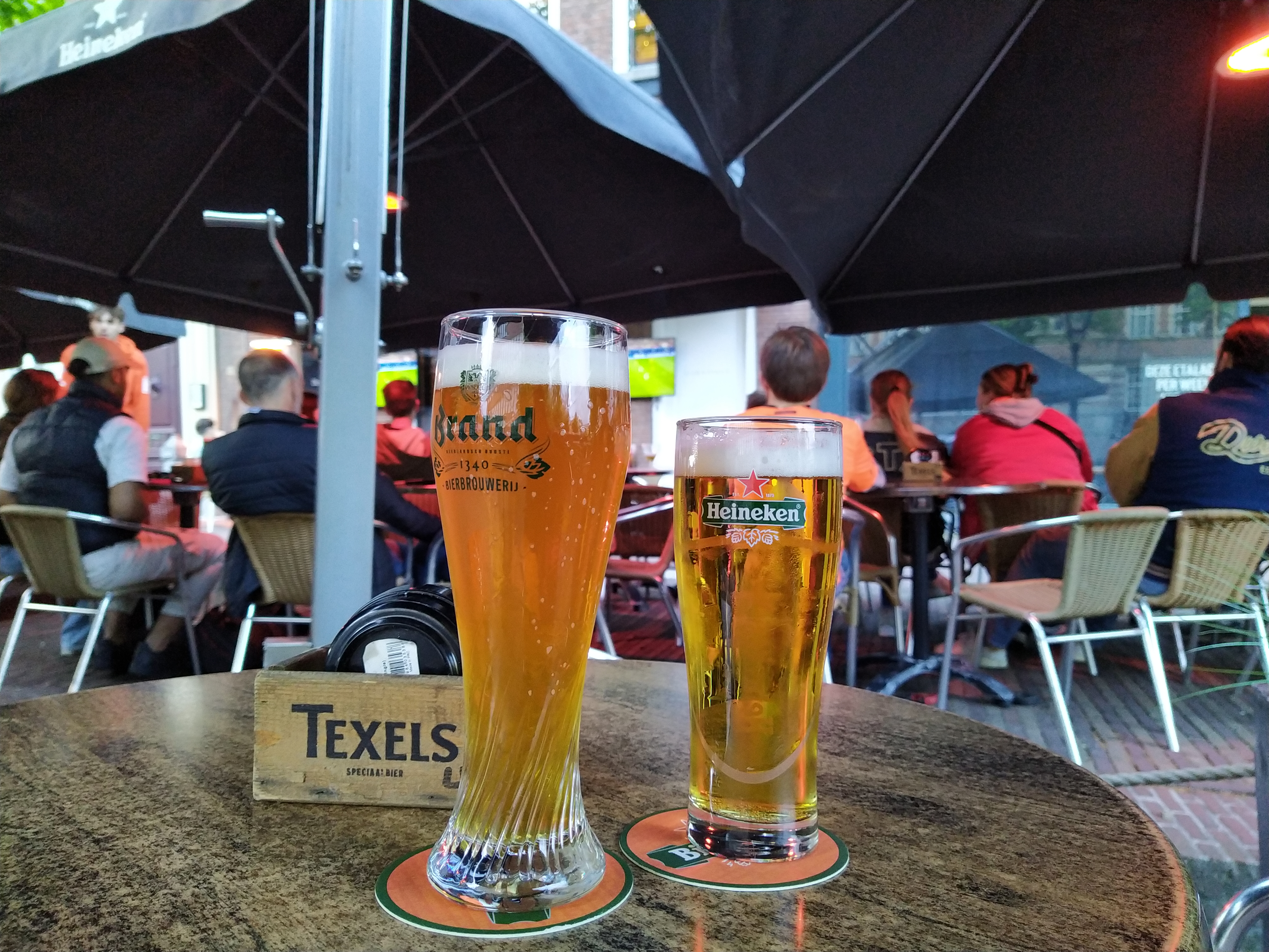 two-glasses-of-beer-on-table-outside-brewery-in-leiden-netherlands